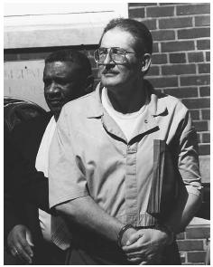 The CIA and FBI significantly delayed the detection of CIA turncoat Aldrich Ames, shown handcuffed, by failing for five years to mount a serious, joint investigation into their loss of Russian agents from 1956 to 1986. AP/WIDE WORLD PHOTOS.