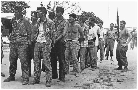 Cuban counter-revolutionaries, members of Assault Brigade 2506, after their capture at the Bay of Pigs, Cuba, in April 1961. ©AFP/CORBIS.