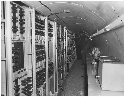 Soviet authorities find amplifiers and other equipment used to tap Russian telephone lines inside the long tunnel in Berlin, Germany, during the Cold War in 1956. Russian officials discovered the tunnel, and charged that it was dug by the American authorities from their Berlin sector across the border. AP/WIDE WORLD PHOTOS.