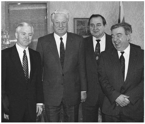 Former U.S. CIA Director Robert Gates, left, visits with former Russian President Boris Yeltsin, second from left, at the Kremlin during the first trip to Moscow by the head of the U.S. intelligence agency in 1992. Also shown are Victor Barannikov, right, former Minister of Security, and Yvgeny Primakov, second from right, former head of the Russian Foreign Intelligence Service, the successor to the KGB. AP/WIDE WORLD PHOTOS.