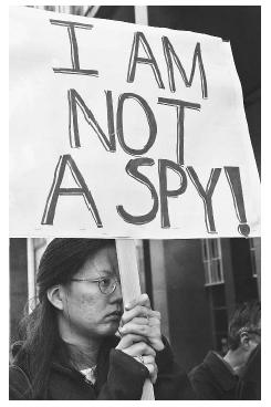 Alberta Lee, daughter of Los Alamos scientist Dr. Wen Ho Lee, protests her father's imprisonment outside the Federal Building in San Francisco. Lee was arrested in 2000 for mishandling classified information. AP/WIDE WORLD PHOTOS.