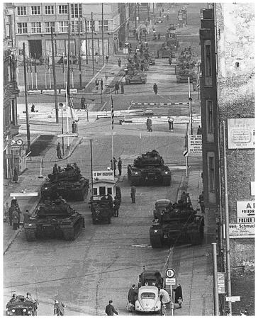 U.S. Army tanks at Checkpoint Charlie, foreground, face Soviet Army tanks in 1961 during the most dangerous of several crises at the Friedrichstrasse checkpoint in Berlin during the Cold War. AP/WIDE WORLD PHOTOS.
