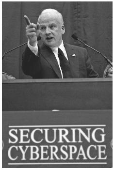 Richard Clarke, the White House's senior security advisor, outlines the administration's 2002 cyberspace security recommendations that include educating users and urging market forces, not government mandates, to fix cyber security problems. AP/WIDE WORLD PHOTOS.