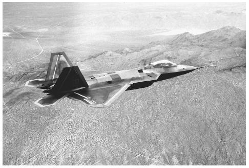This April 1999 U.S. Air Force file photo shows the F-22 Raptor in a test flight over Edwards Air Force Base in California. The aircraft features muti-spectral countermeasures and wide field-of-regard offensive and defensive sensors. ©AFP/CORBIS.