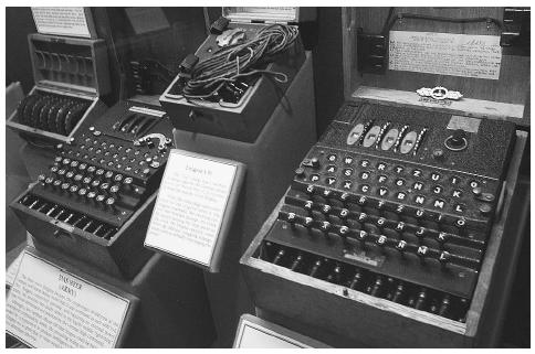 A four-rotor Enigma machine, right, which was used by the crews of German U-boats in World War II to send coded messages. AP/WIDE WORLD PHOTOS.