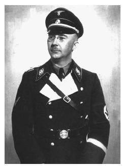 Heinrich Himmler, chief of the Gestapo, the German secret police, poses in his military uniform in 1938. AP/WIDE WORLD PHOTOS.