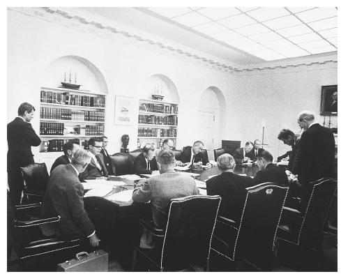 During the Cuban Missile Crisis in October 1962, President John F. Kennedy meets with his cabinet and advisors at the White House. ©BETTMANN/CORBIS.
