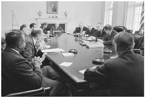 President Lyndon Johnson (right side, second from right) shown meeting with the National Security Council in 1964 with the prime topic expected to be the North Vietnamese torpedo boat attack on the U.S. destroyer Maddox. ©BETTMANN/CORBIS.